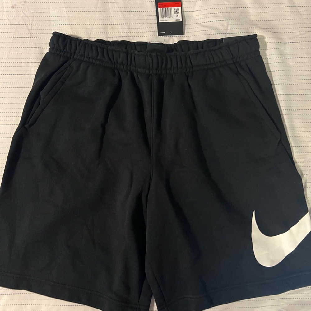 Nike Black Athletic Shorts with White Swoosh